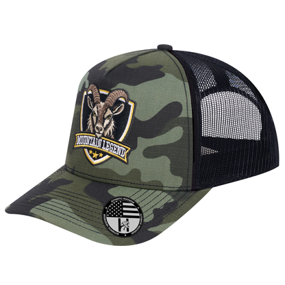 The Mountain Legend Goat 5-Panel Trucker Hat - Green Camo front and Black mesh back - angled view