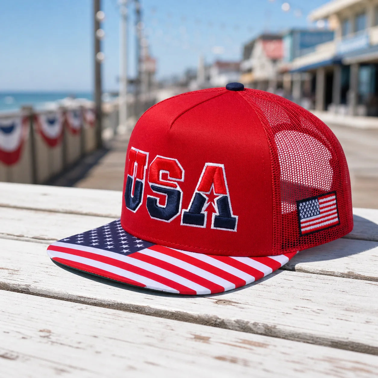 Man wearing the exact HAVINA PRO CAPS red USA trucker hat at a seaside cookout